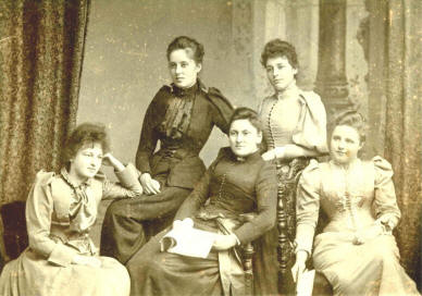 group of victorian girls posed in studio
